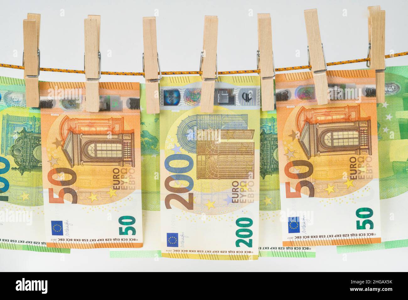 Euro notes, clothesline, symbol photo money laundering, studio shot
