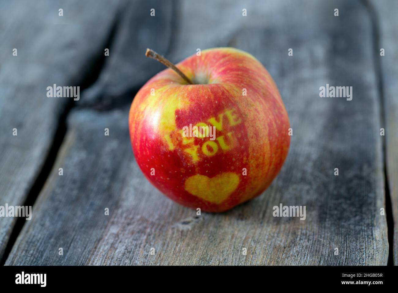 apple with heart and text 'i love you' Stock Photo