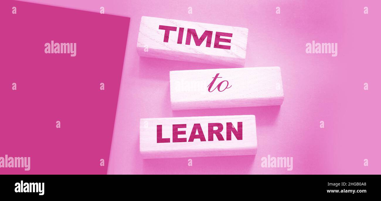 Time to Learn on wooden blocks put black. Education concept. Life-time ...
