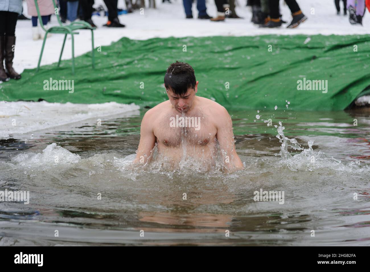 People of orthodox religion bathe in cold water during the celebration