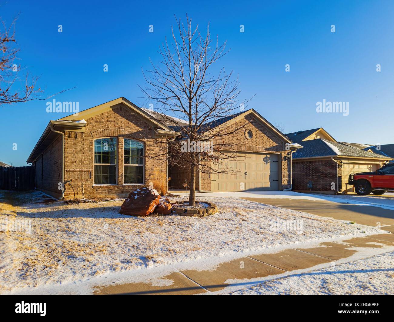 Sunny view of some residence building after a snow storm at Edmond