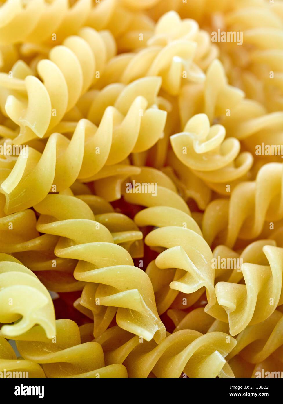Macro food ingredient still life of Fusilli, fuˈzilli, pasta Stock