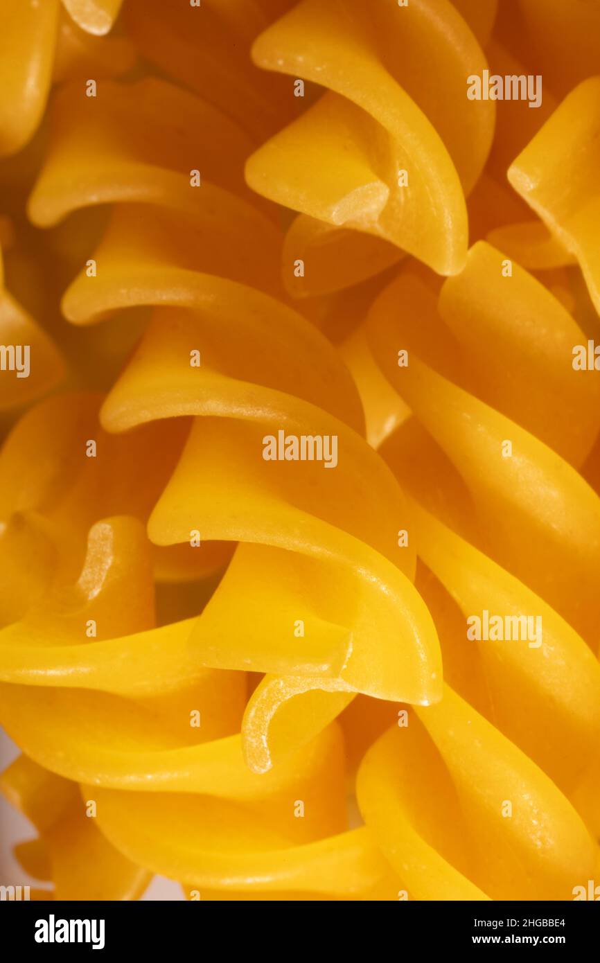 Macro food ingredient still life of Fusilli, fuˈzilli, pasta Stock