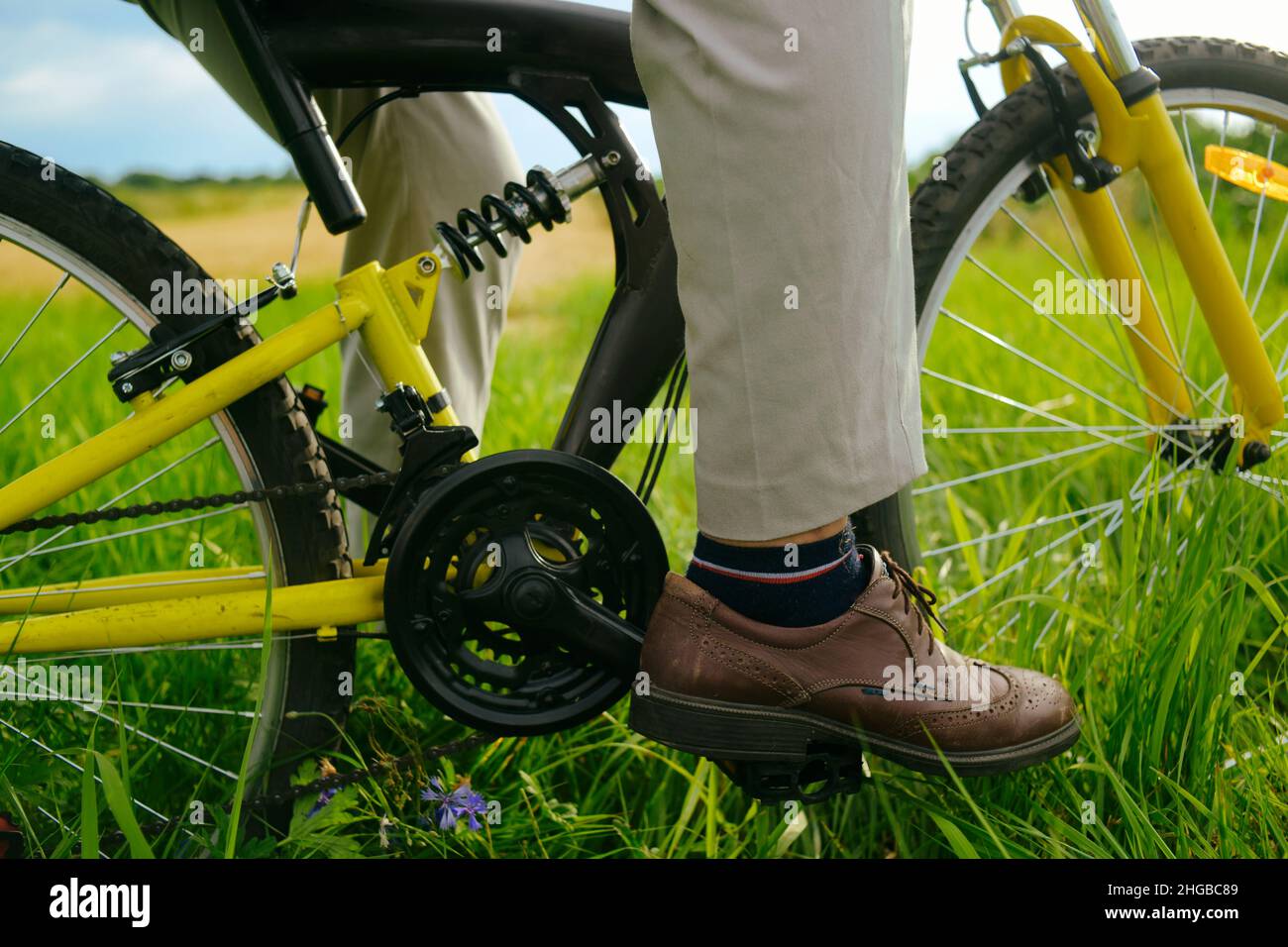 Male feet on pedals, bike, mountain. Wheel Stock Photo Alamy