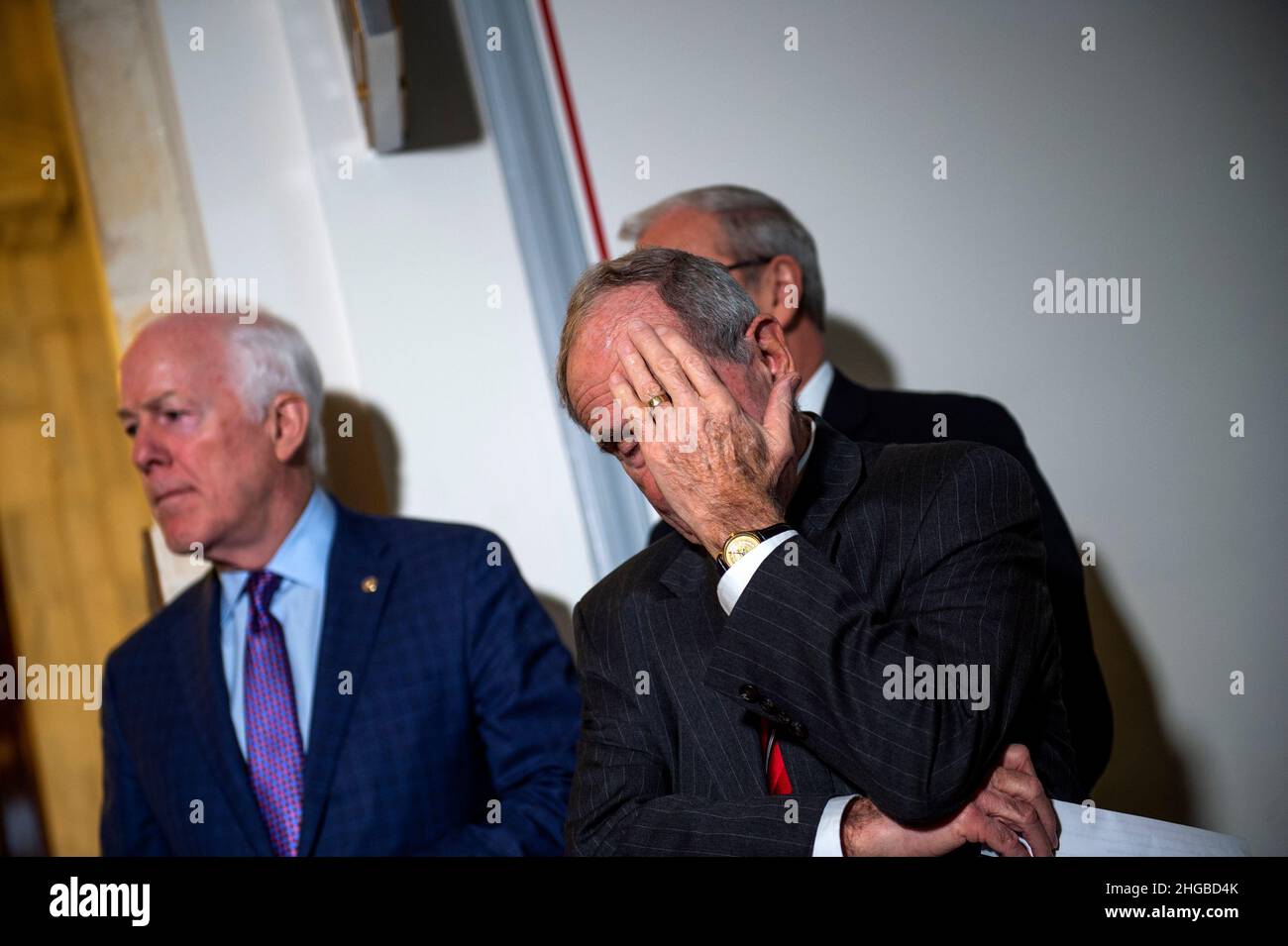 United States Senator Jim Risch (Republican of Idaho) wipes his face as GOP members of the Senate Committee on Armed Services and the Senate Committee on Foreign Relations offer remarks on the current situation between Russia and the Ukraine, in the Russell Senate Office Building in Washington, DC, Wednesday, January 19, 2022. Credit: Rod Lamkey/CNP /MediaPunch Stock Photo