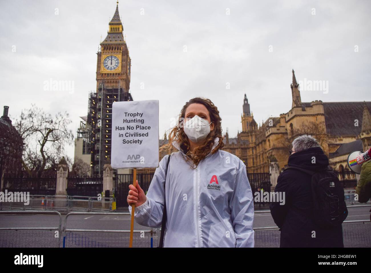 London, UK. 19th Jan, 2022. Animal Welfare Party leader Vanessa Hudson holds an anti-trophy hunting placard during the Worldwide Rally Against Trophy Hunting.Activists gathered at Parliament Square calling for a ban on trophy hunting and trophy hunting imports. Credit: SOPA Images Limited/Alamy Live News Stock Photo