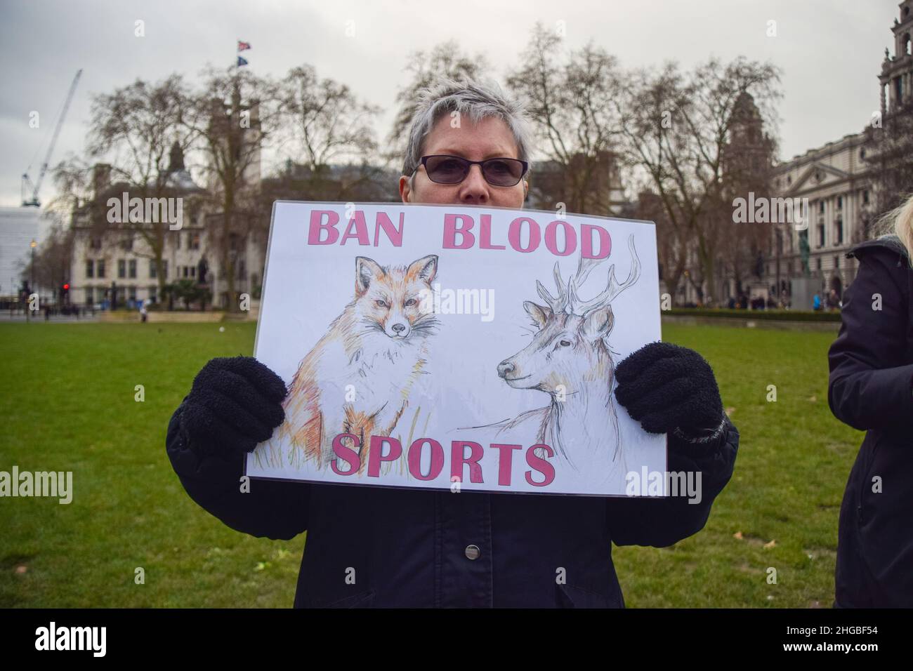 London, UK. 19th Jan, 2022. A protester holds an anti-hunting placard during the Worldwide Rally Against Trophy Hunting.Activists gathered at Parliament Square calling for a ban on trophy hunting and trophy hunting imports. (Photo by Vuk Valcic/SOPA Images/Sipa USA) Credit: Sipa USA/Alamy Live News Stock Photo