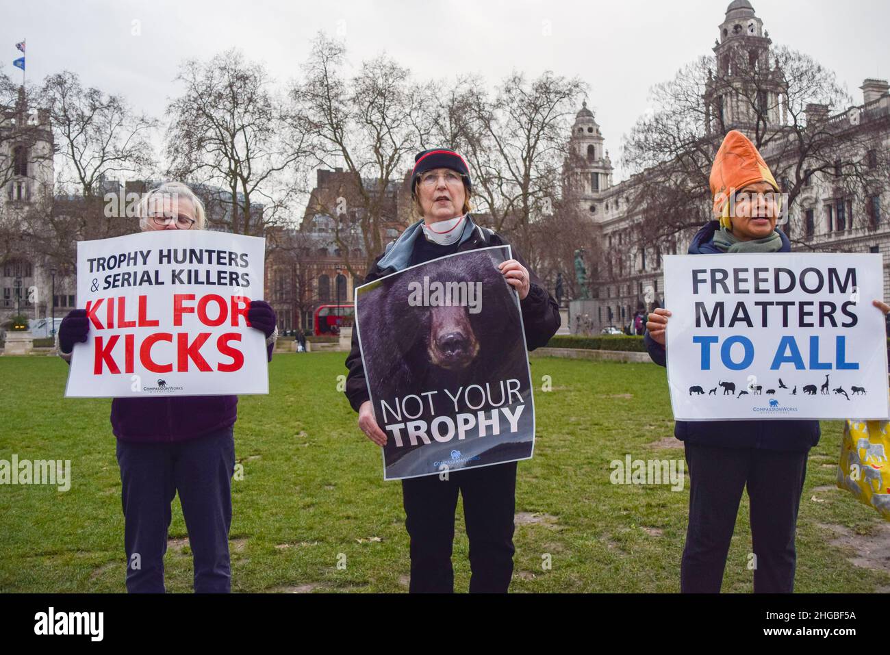 London, UK. 19th Jan, 2022. Protesters hold anti-trophy hunting placards during the Worldwide Rally Against Trophy Hunting.Activists gathered at Parliament Square calling for a ban on trophy hunting and trophy hunting imports. (Photo by Vuk Valcic/SOPA Images/Sipa USA) Credit: Sipa USA/Alamy Live News Stock Photo