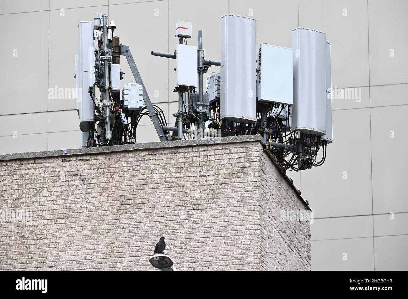 View of a cluster cell phone tower, known as “Cell Sites”, atop a 
