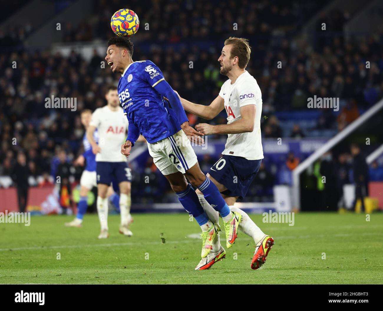 Leicester, England, 19th January 2022.   James Justin of Leicester City nudged over by Harry Kane of Tottenham during the Premier League match at the King Power Stadium, Leicester. Picture credit should read: Darren Staples / Sportimage Credit: Sportimage/Alamy Live News Stock Photo