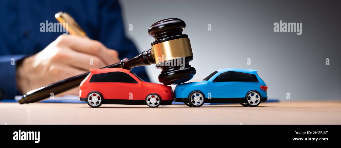 Car Accident Liability Insurance And Lawyer Or Judge Stock Photo