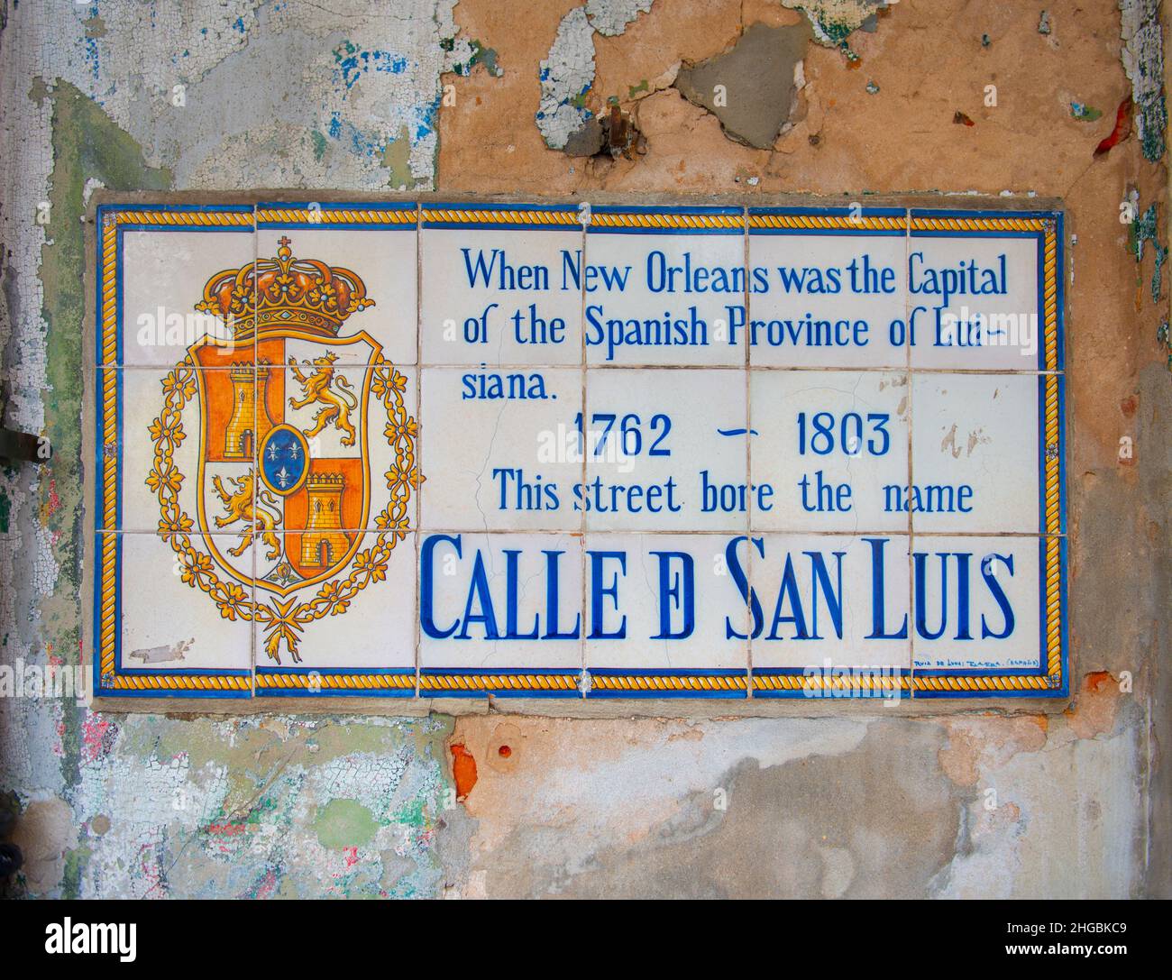 St Louis Street Sign with historic road name as Calle de San Luis in Spanish in French Quarter in New Orleans, Louisiana LA, USA. Stock Photo