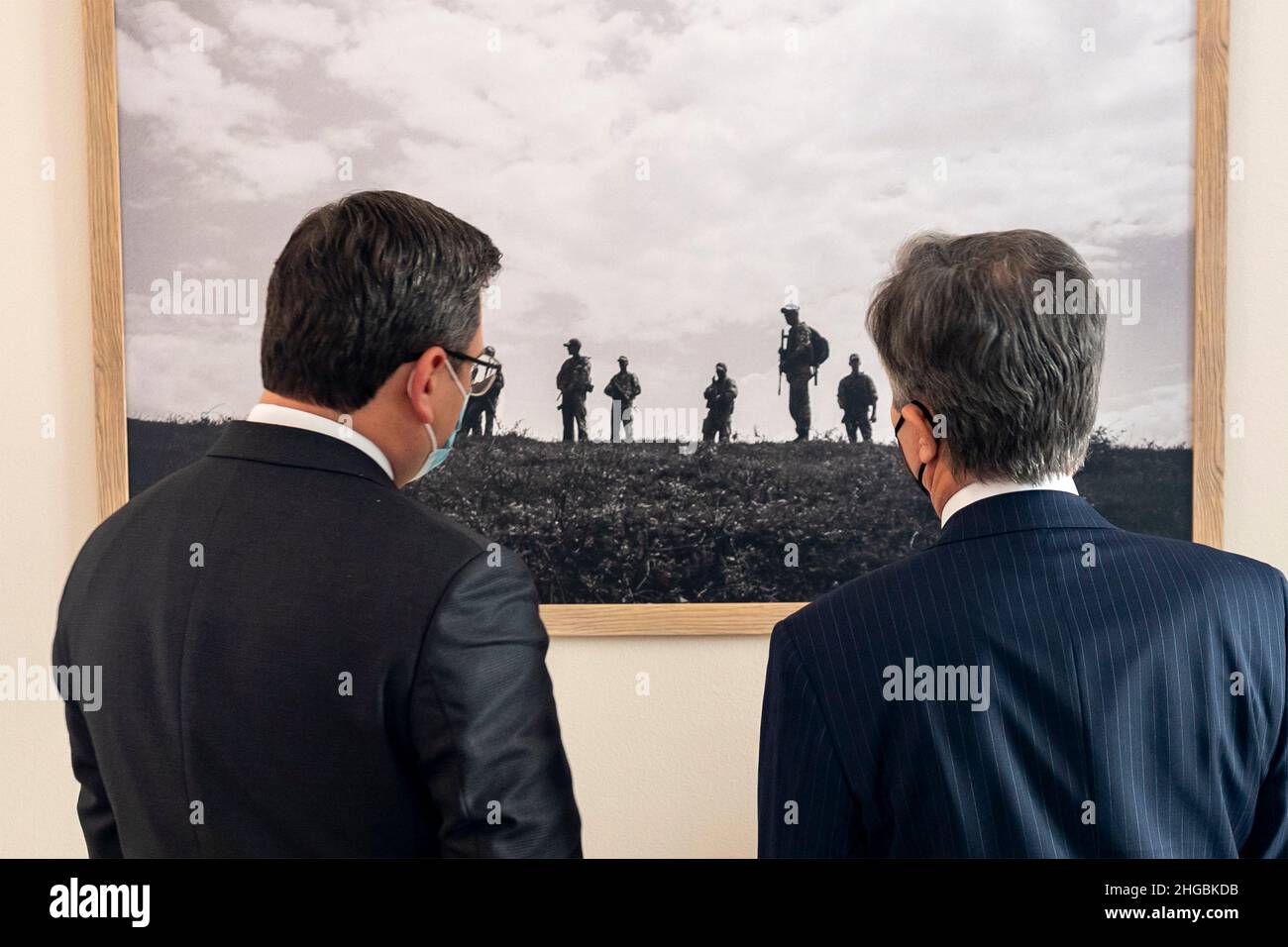 Kyiv, Ukraine. 19th Jan, 2022. U.S. Secretary of State Antony Blinken views a photograph with Ukrainian Foreign Minister Dmytro Kuleba, left, before a bilateral meeting, January 19, 2022 in Kyiv, Ukraine. Blinken is in Ukraine to avert a Russian attack. Credit: Ron Przysucha/State Department/Alamy Live News Stock Photo