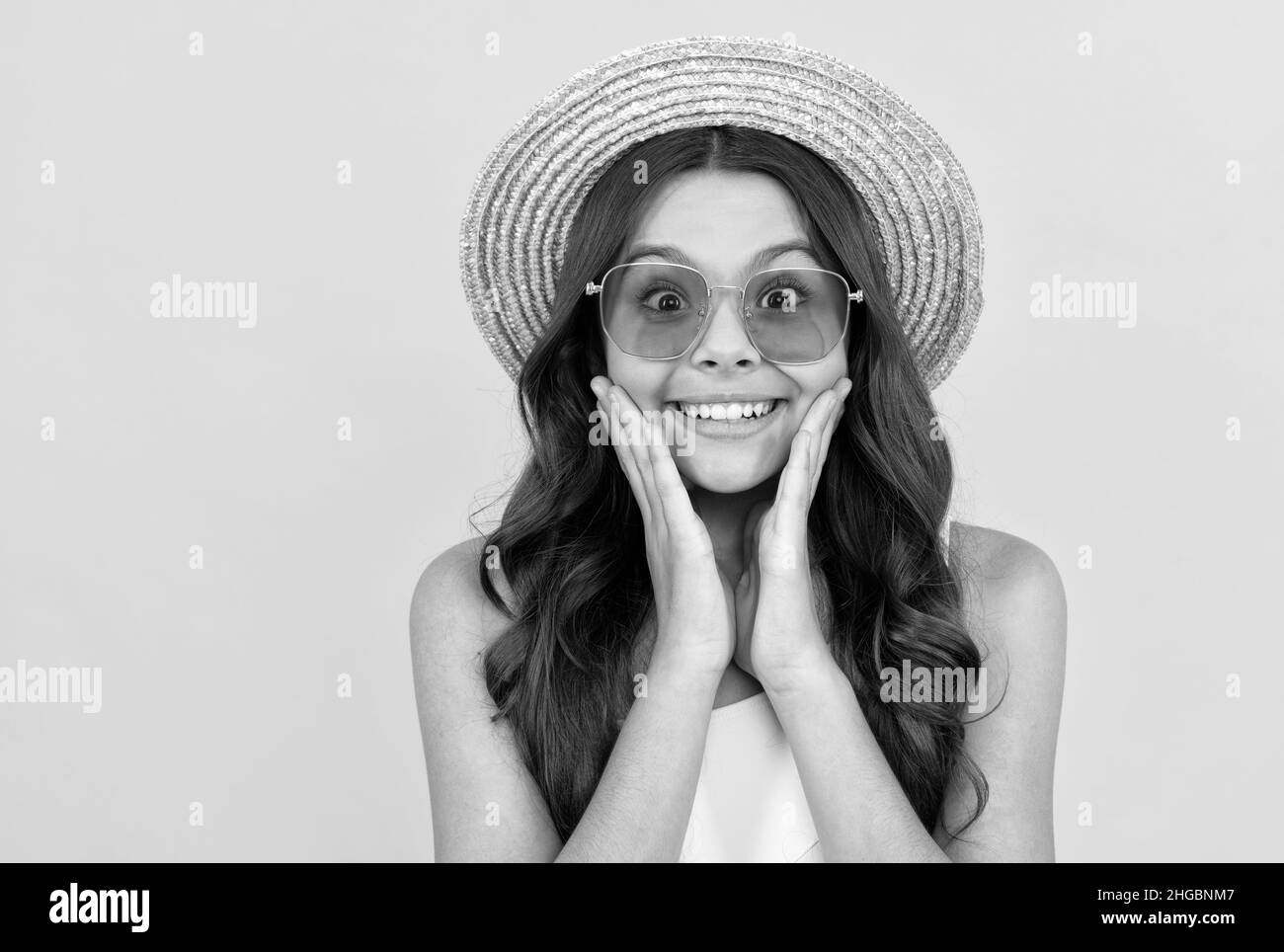wow. finally summer holiday. small beauty. child wear straw hat and