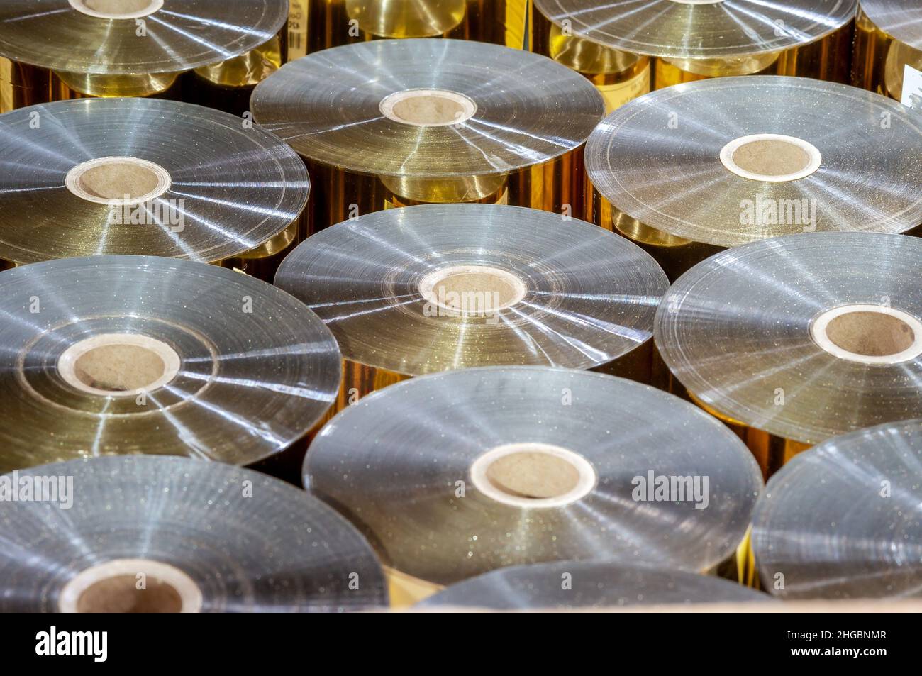 Foil in the printing shop. Aluminum technical foil. Rolls of foil for