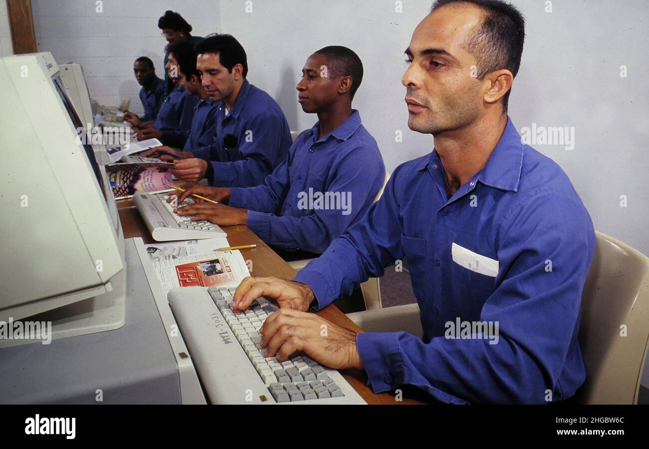 Kyle, Texas USA 1991: Computer classes for prisoners in private prison preparing them for release into the real world. They are given job training about six months before release.  MR-EV 120-132. ©Bob Daemmrich Stock Photo
