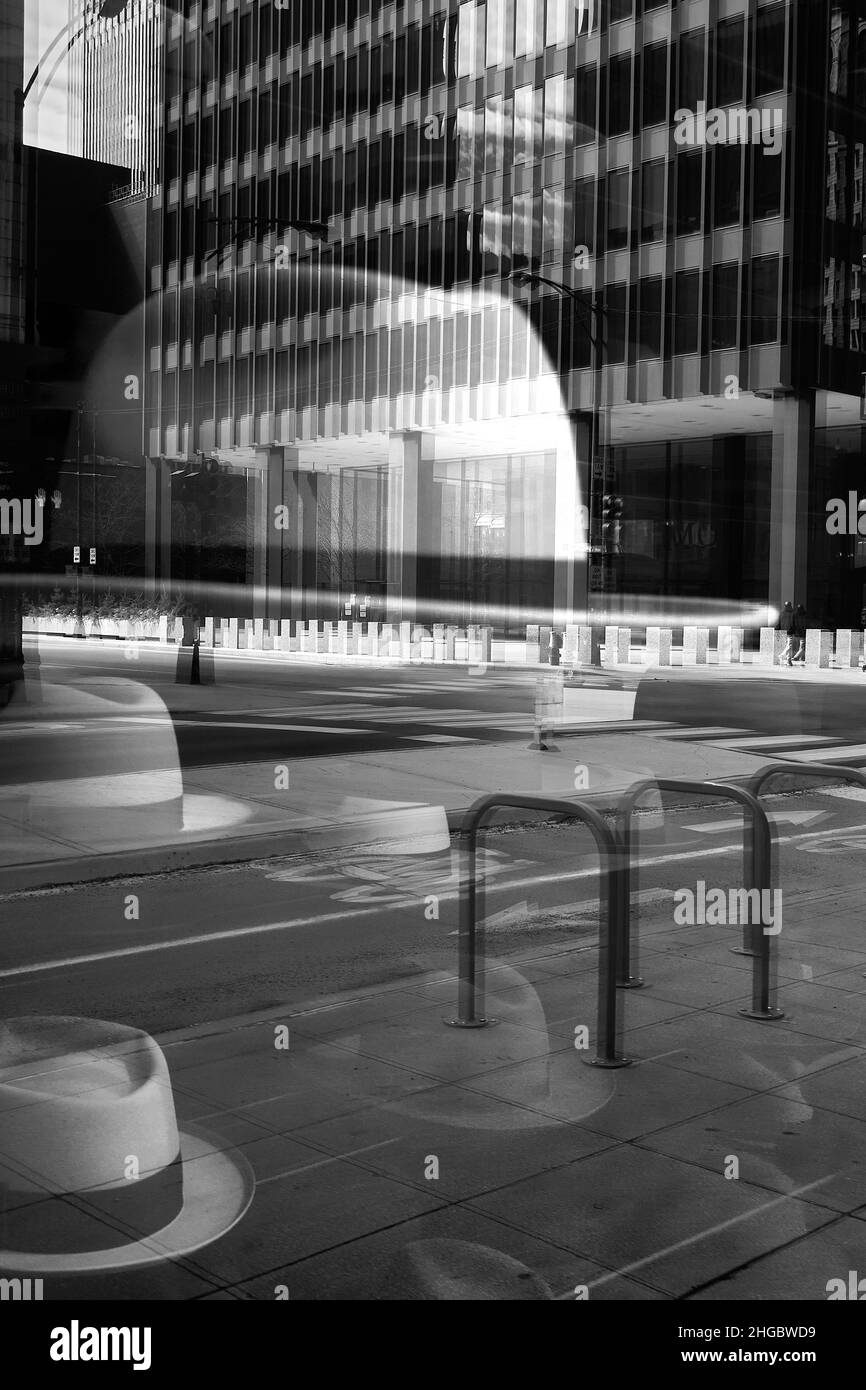 Layers of images seen through the glass with reflections on the surface Stock Photo