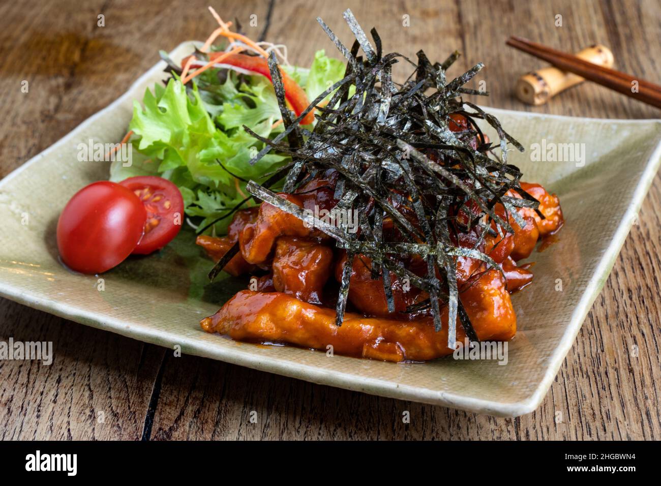 Japanese fried pork dish itamemono. Stock Photo