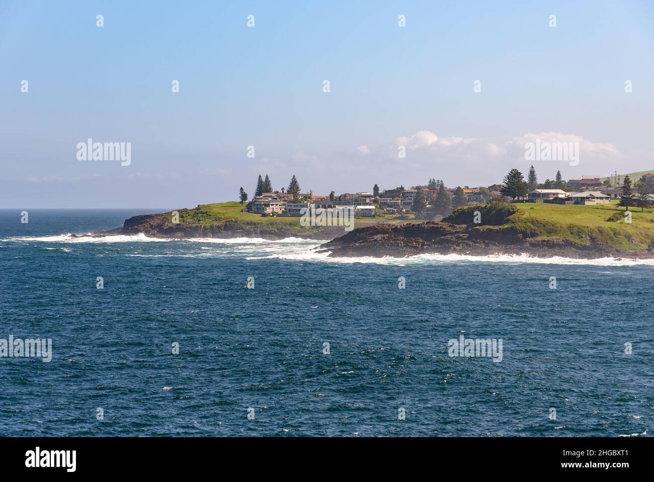 Marsden Head, Kiama, as seen across the water Stock Photo