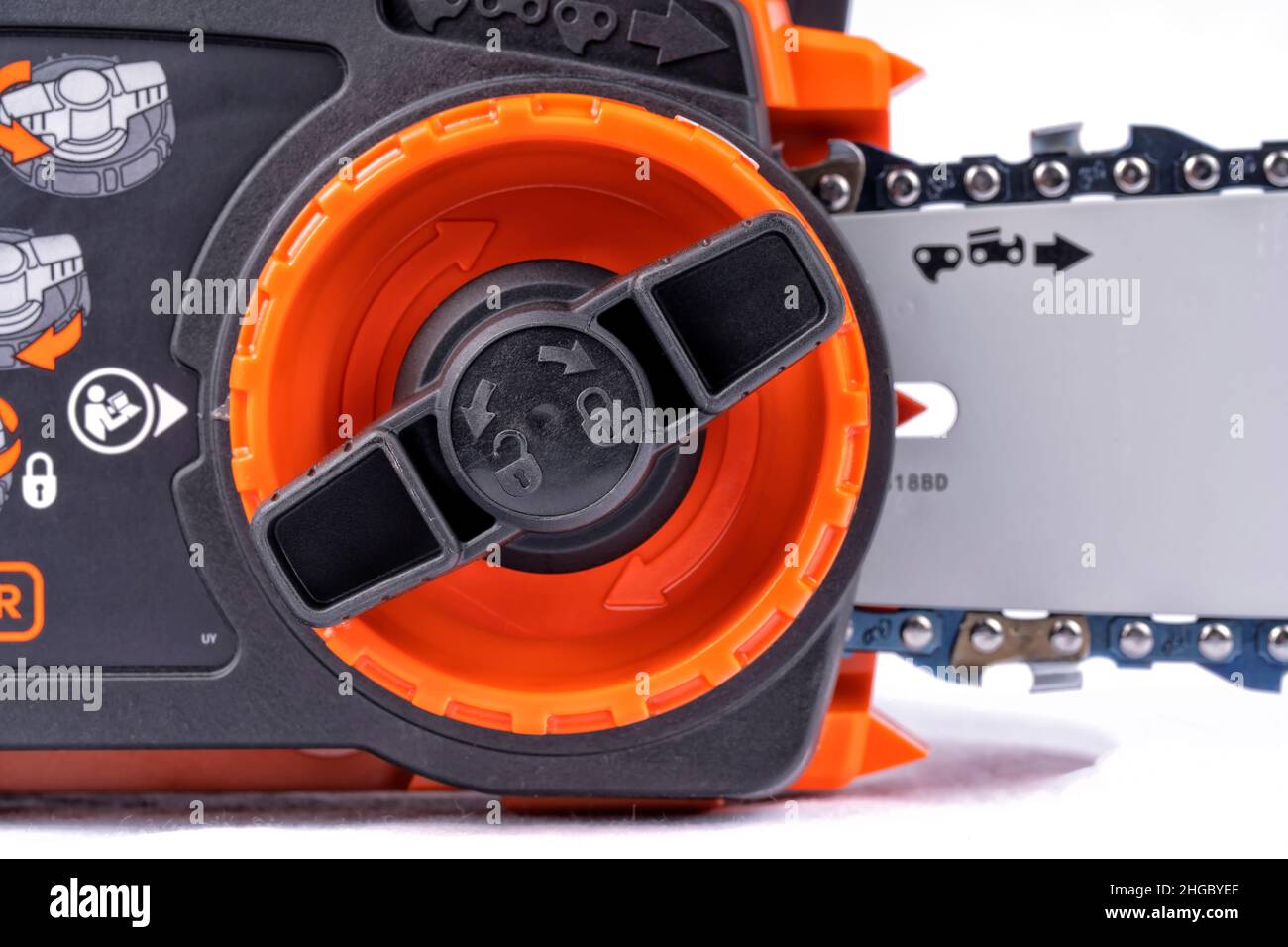 Detail of the mechanism to adjust the chain of an electric chainsaw