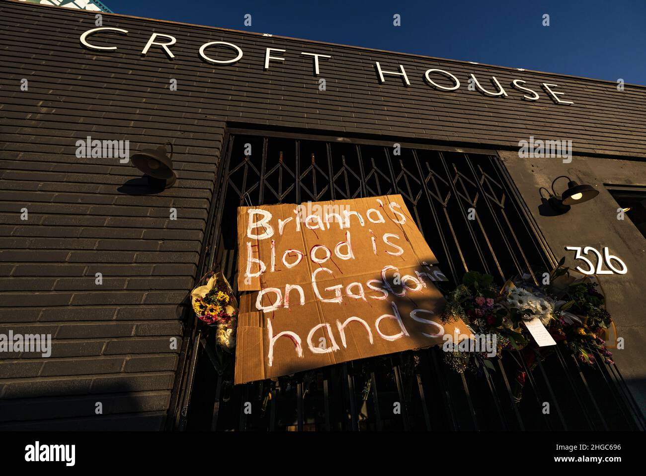 A window and street memorial for Brianna Kupfer. Brianna was brutally ...
