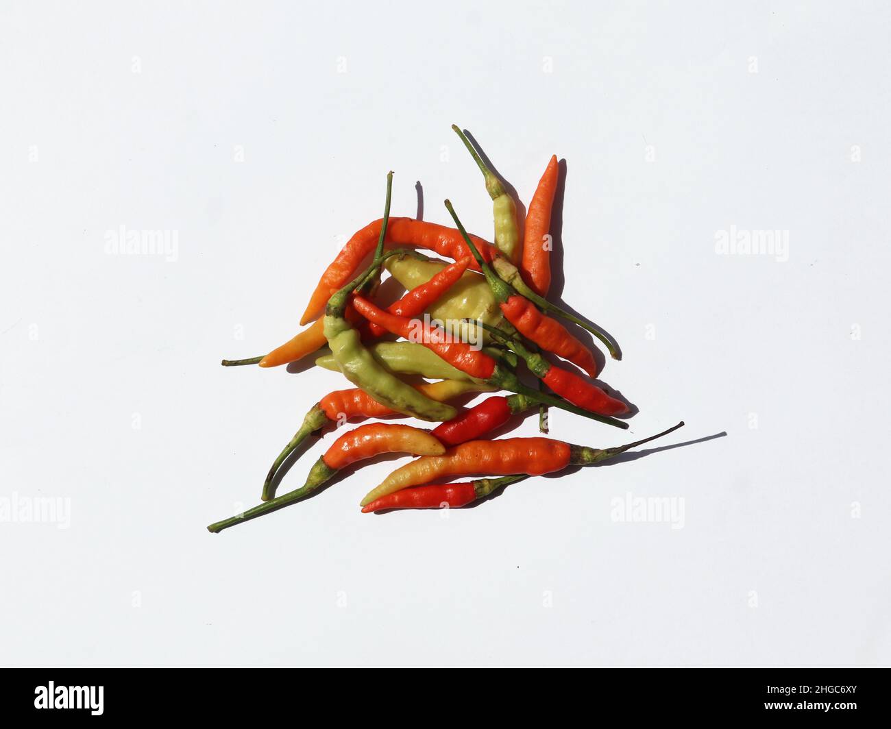 Red hot chili peppers on white background Stock Photo