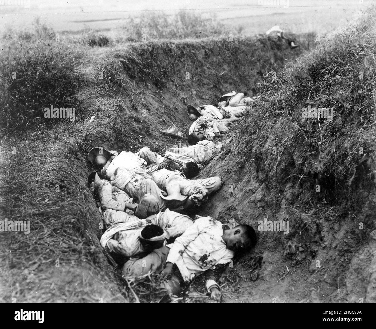 Filipino casualties dead in a trench on the first day of the  Filipino-American war which lasted from 1899 to 1902 Stock Photo