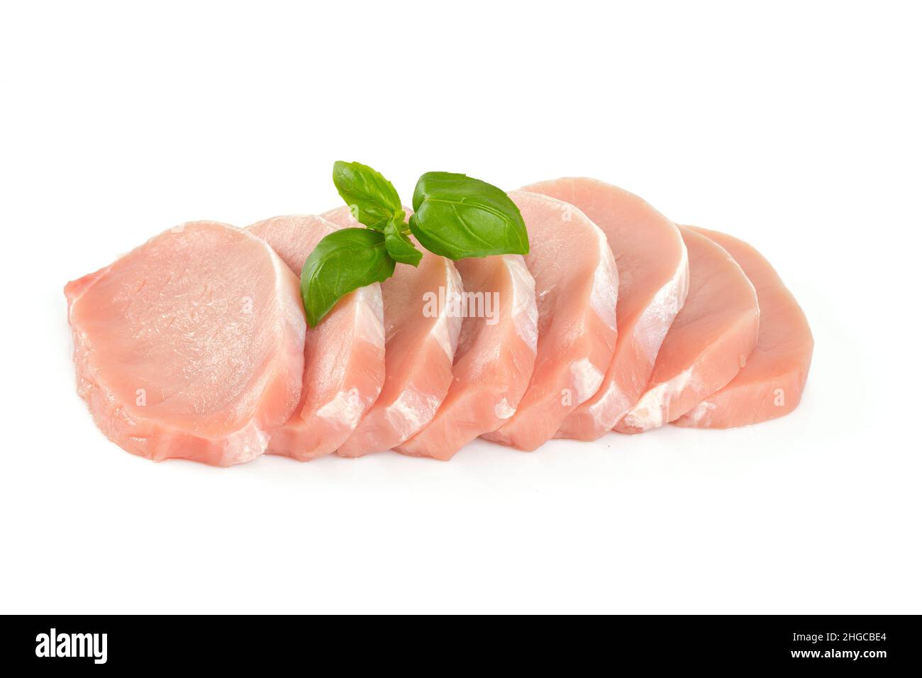 raw pork pieces isolated on white background Stock Photo - Alamy