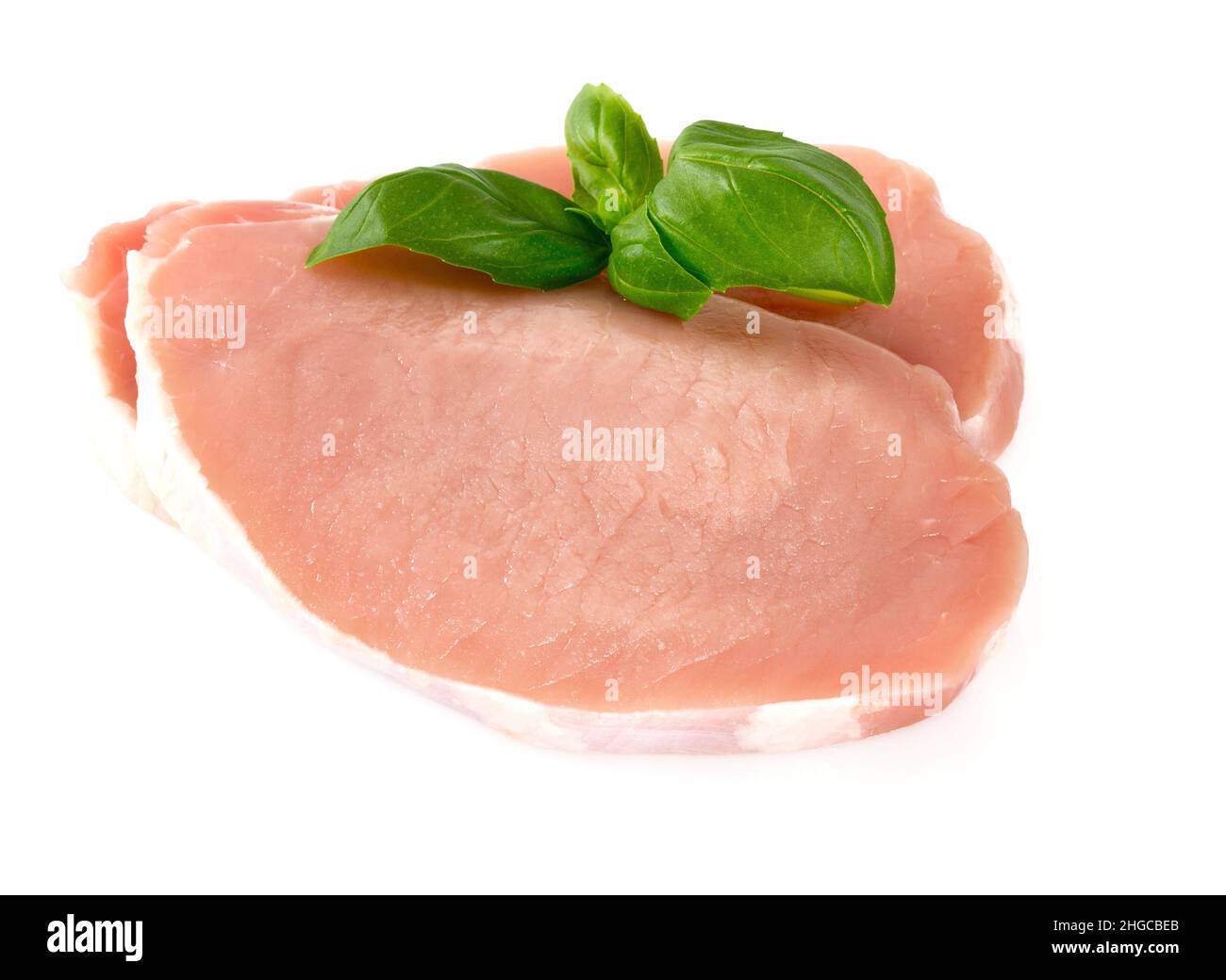 raw pork pieces isolated on white background Stock Photo - Alamy