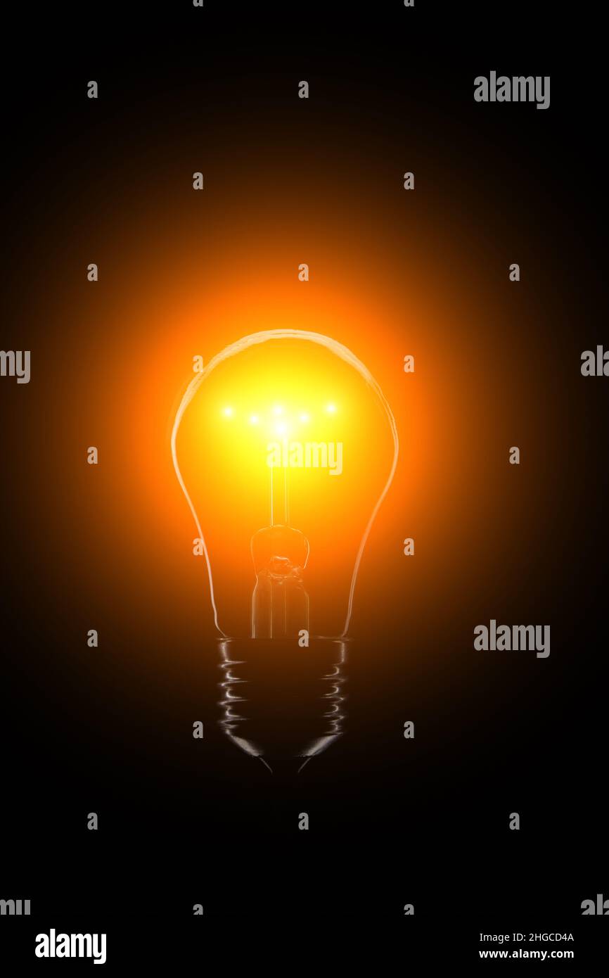 Bright light bulb on black background Stock Photo