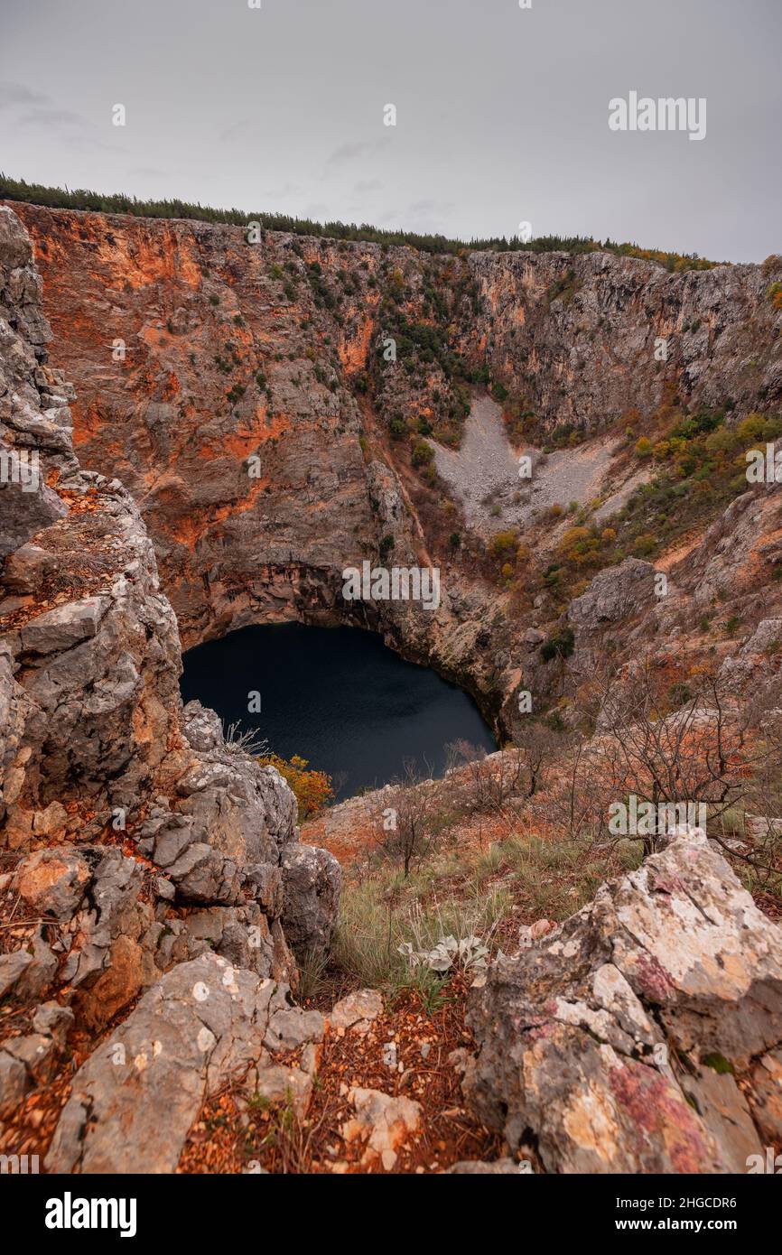 Magnificent and majestic red lake close to Imotski, a crater or sinkhole in  limestone filled with water, more than 500m deep. December feeling in the  Stock Photo - Alamy