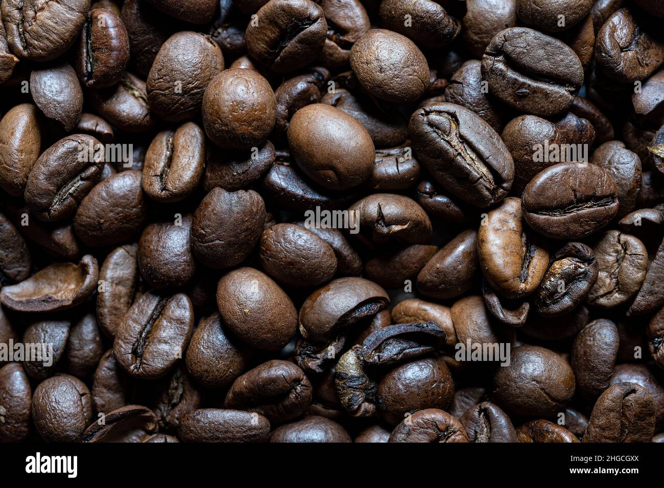 a background formed with some roasted coffee beans Stock Photo - Alamy