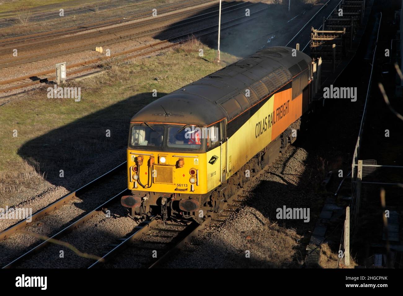 Colas Rail Class 56 loco 56113 hauls the 1310 Scunthorpe to York infrastructure service on the freight avoiding line through Scunthorpe on 18/01/22. Stock Photo