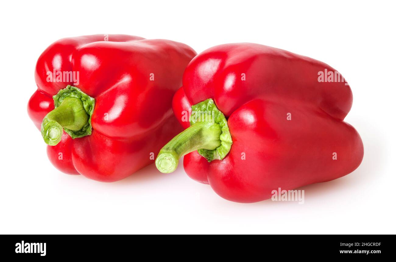 Fresh red bell peppers isolated on white background Stock Photo - Alamy