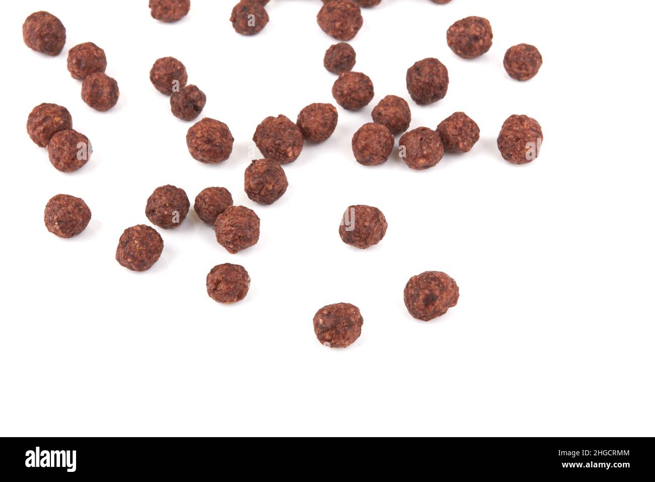 Chocolate cereal balls isolated on white background Stock Photo - Alamy