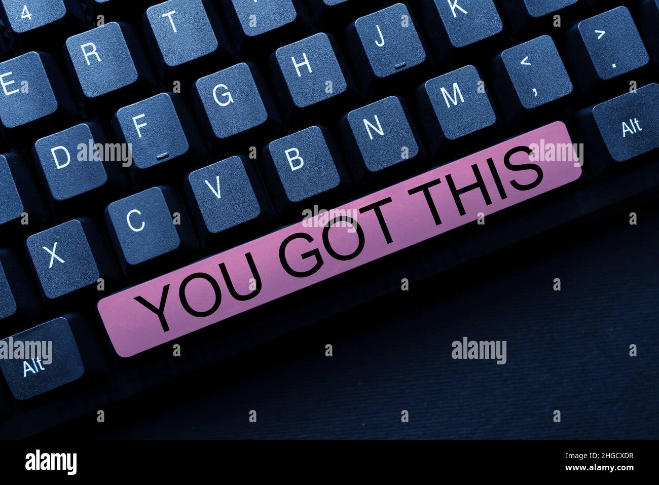 Hand writing sign You Got This. Word Written on to encourage someone to ...