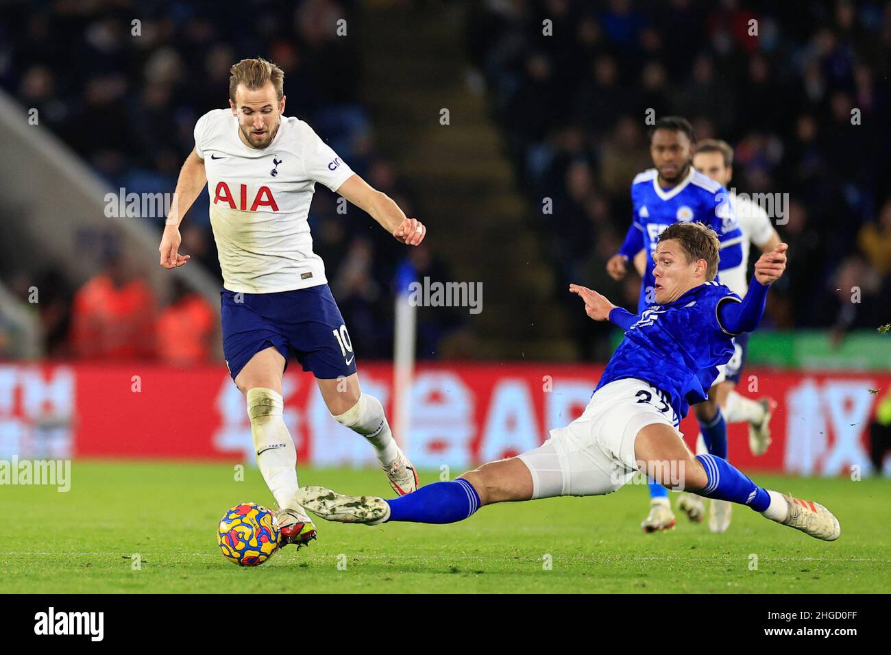 Leicester, UK. 19th Jan, 2022. Harry Kane #10 of Tottenham Hotspur is tackled by Jannik Vestergaard #23 of Leicester City in Leicester, United Kingdom on 1/19/2022. (Photo by Conor Molloy/News Images/Sipa USA) Credit: Sipa USA/Alamy Live News Stock Photo