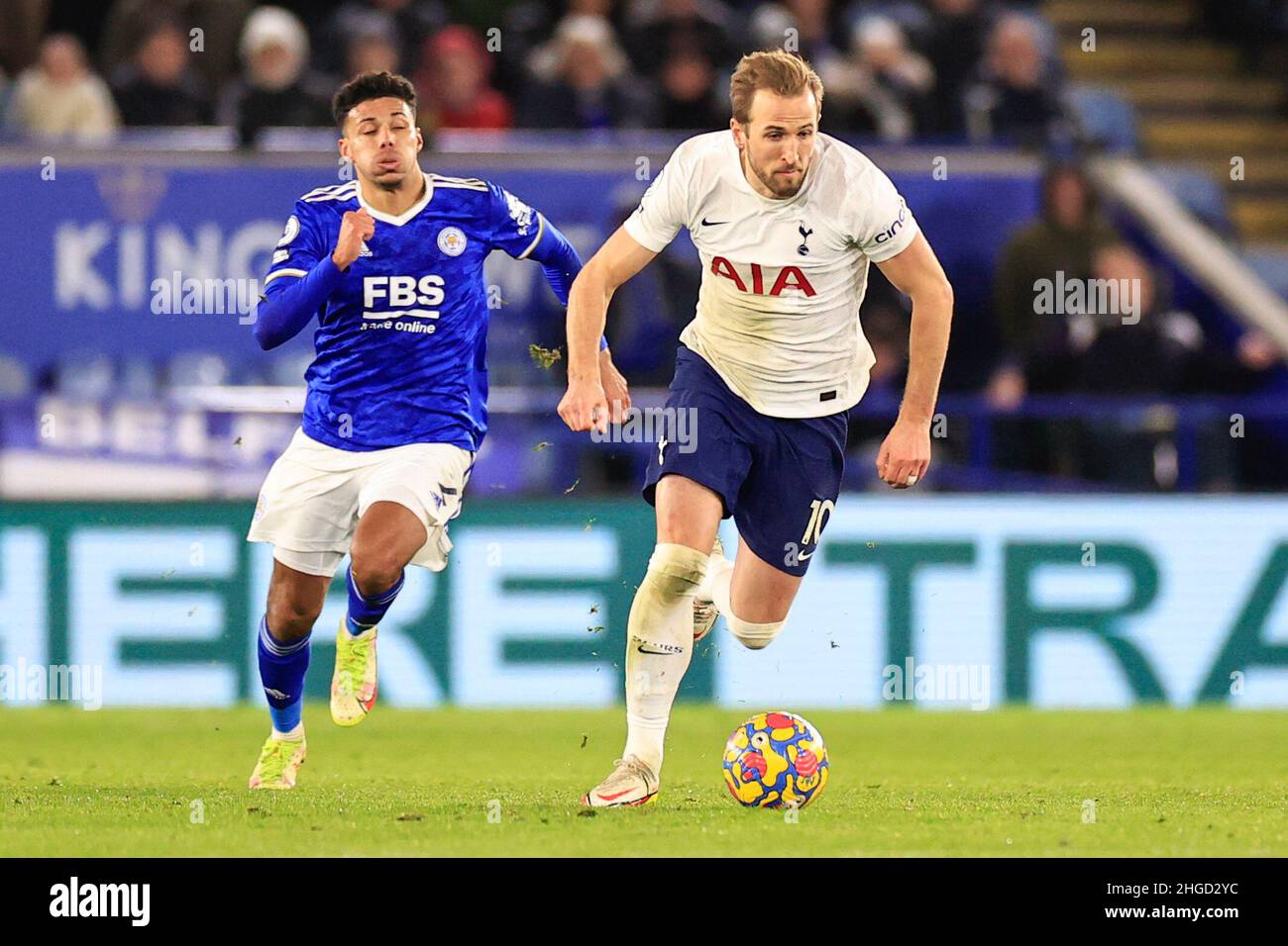 Leicester, UK. 19th Jan, 2022. Harry Kane #10 of Tottenham Hotspur is chased by James Justin #2 of Leicester City in Leicester, United Kingdom on 1/19/2022. (Photo by Conor Molloy/News Images/Sipa USA) Credit: Sipa USA/Alamy Live News Stock Photo