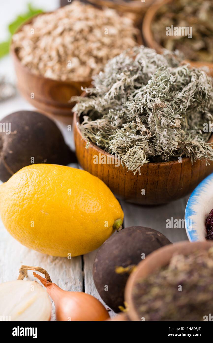 Black radish, horseradish root and dry herbs with expectorant effect Stock Photo Alamy