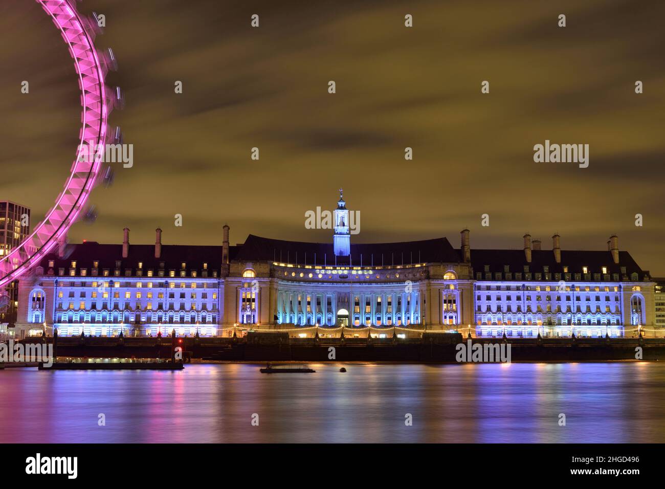 London Eye and County Hall, South Bank of River Thames, Westminster, London, United Kingdom Stock Photo