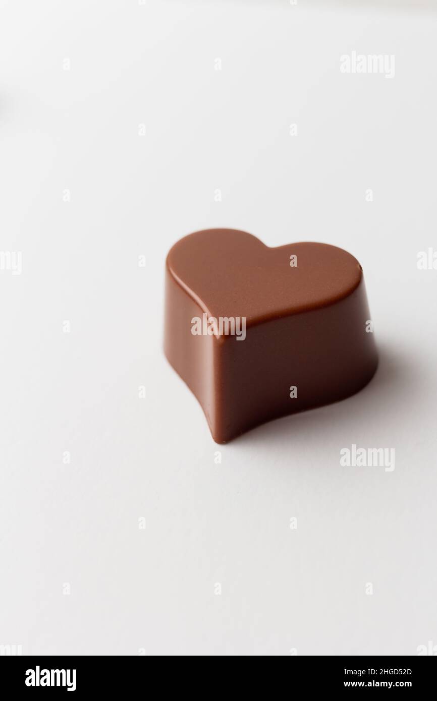 Chocolate heart shape isolated on white background. Stock Photo