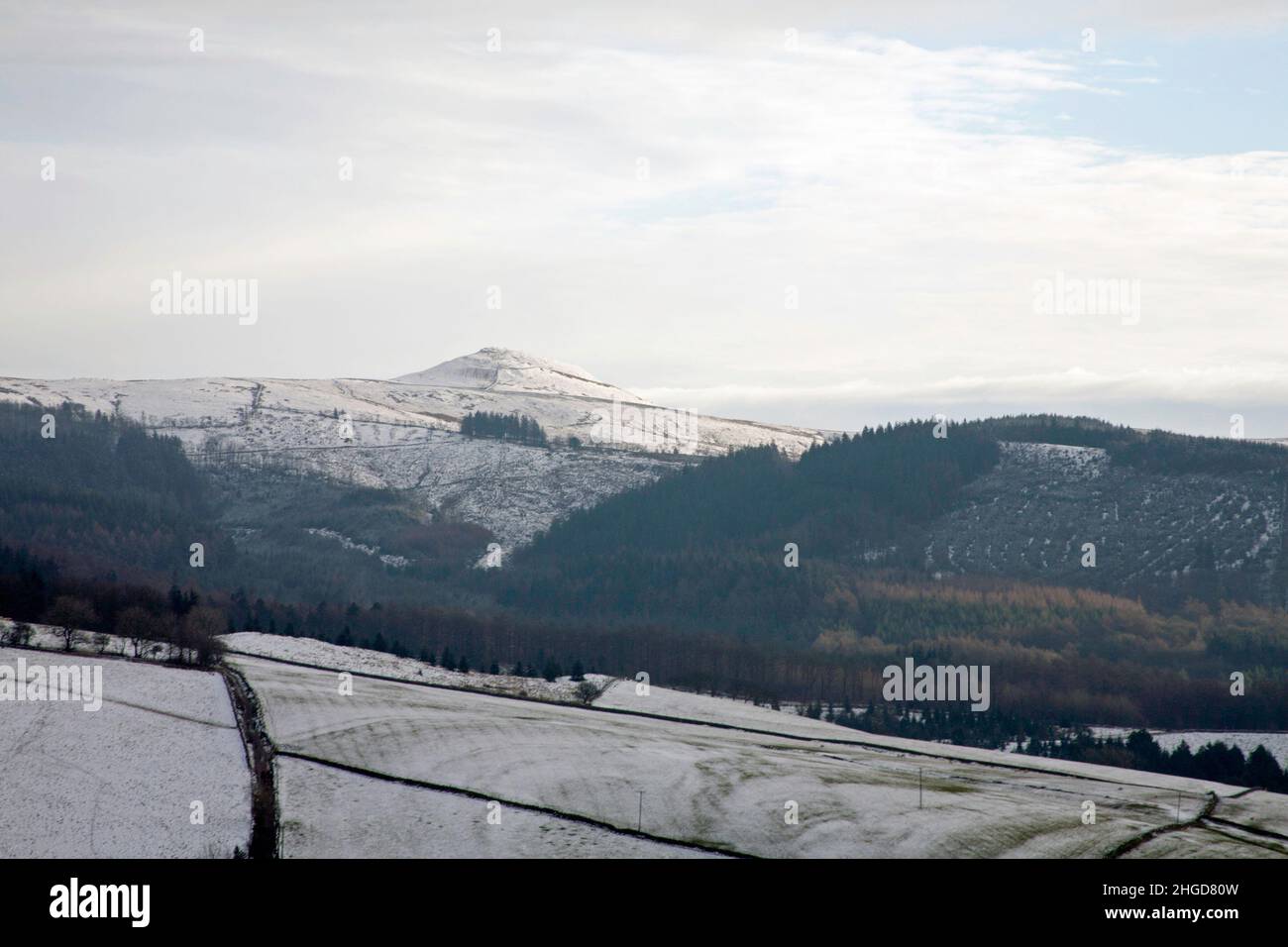 Shutlingsloe rising above the Macclesfield Forest viewed on a winter's day  from near Tegg's Nose Macclesfield Cheshire England Stock Photo