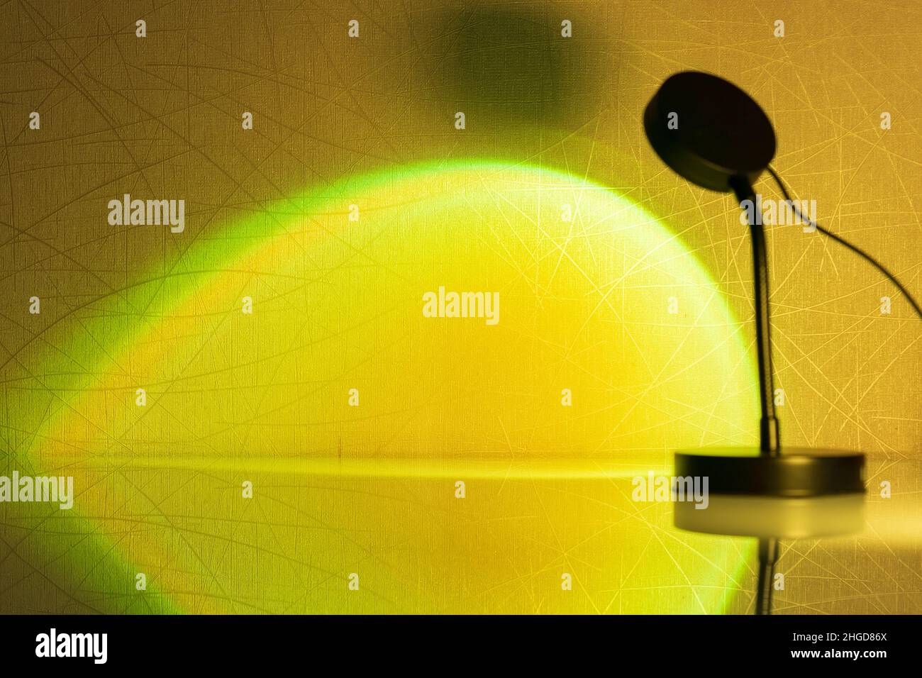 Sunset projector lamp close up. Multi colored RGB light. Home decor. Selective focus Stock Photo