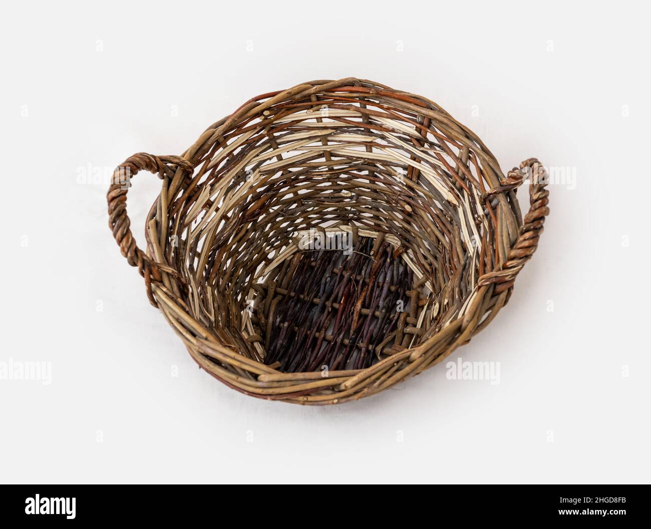 Wicker basket isolated Stock Photo