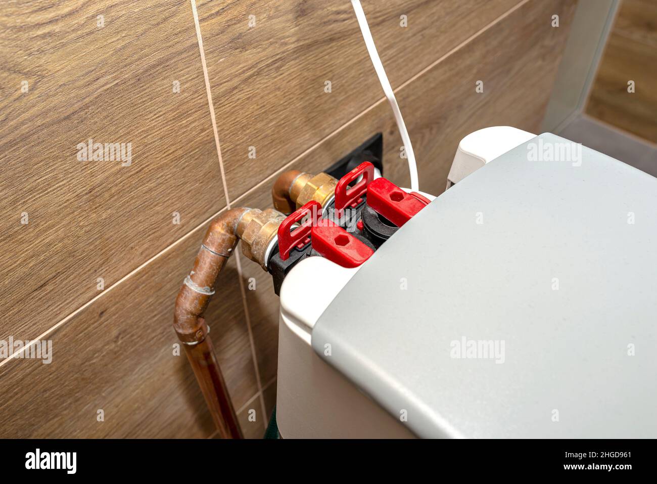 Copper pipes supplying water to a domestic stagnant water softener in