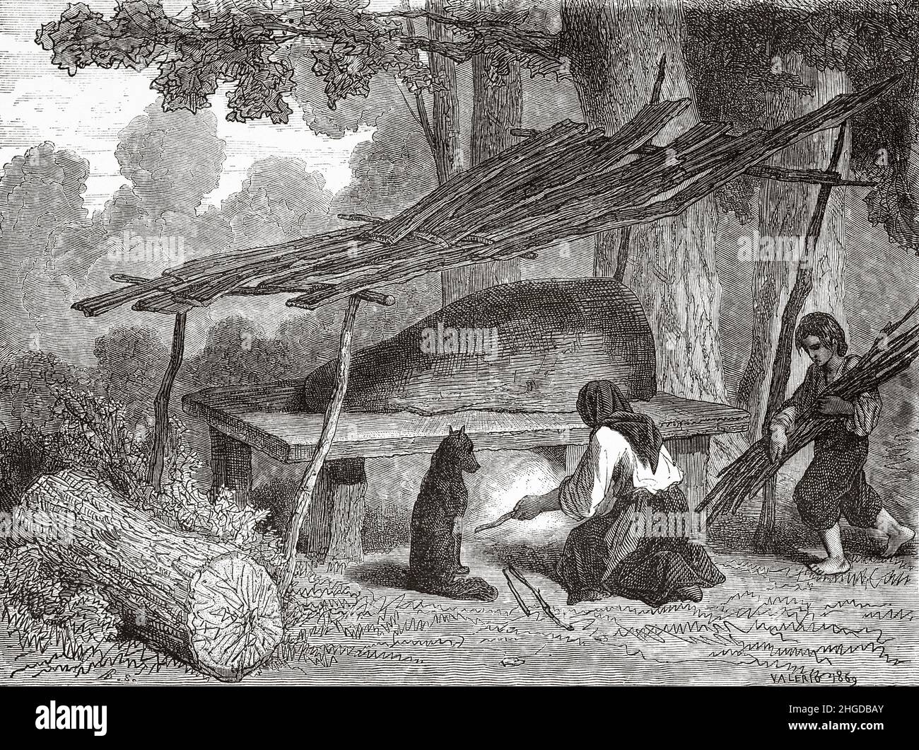 Gypsies preparing food in an oven in the forest at Puszta, great Hungarian plain, Hungary, Europe. Old 19th century engraved illustration from Voyage to the Southern Slavs by Georges Perrot, Le Tour du Monde 1870 Stock Photo