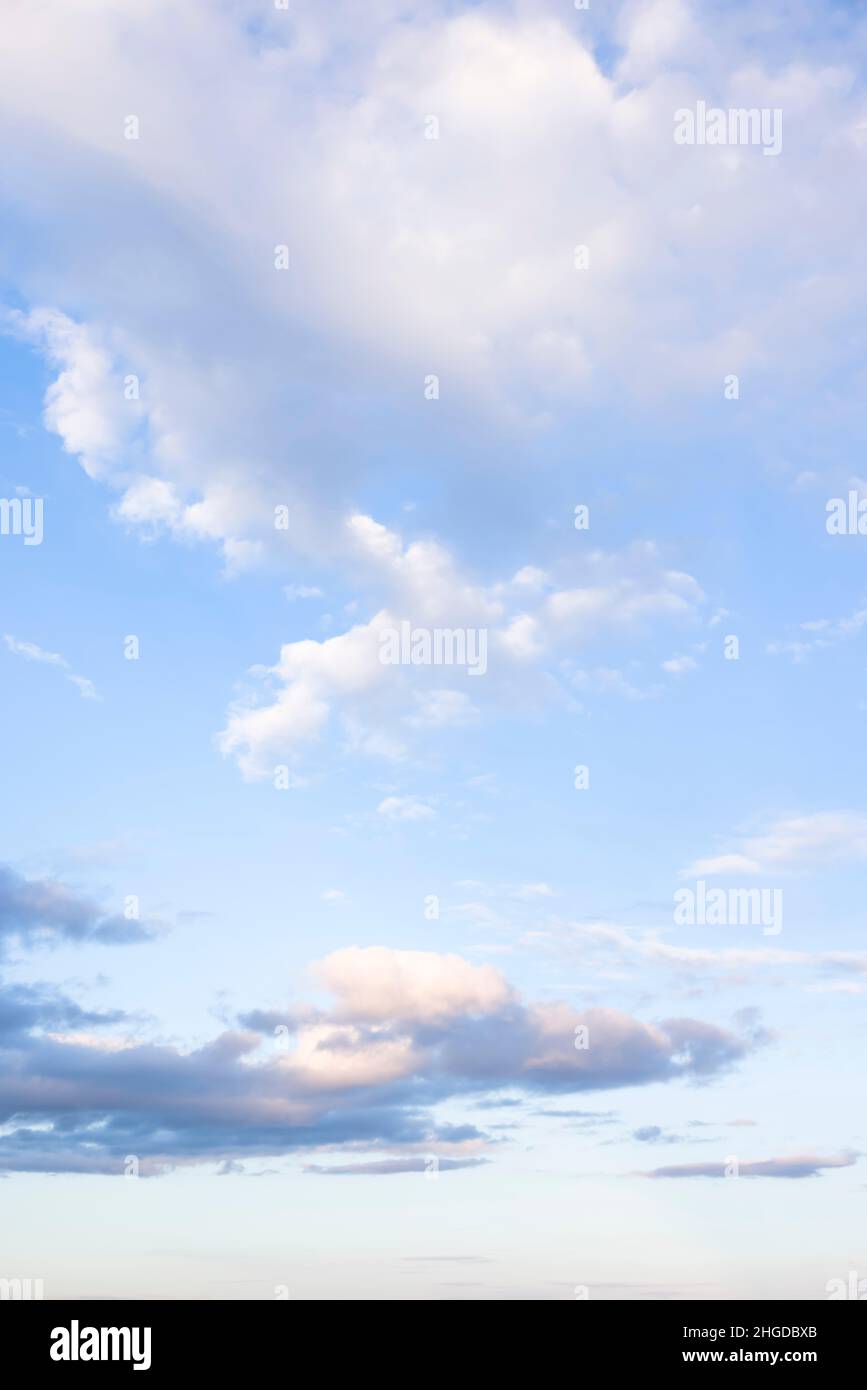 Blue sky with clouds in sunlight. Background or template Stock Photo