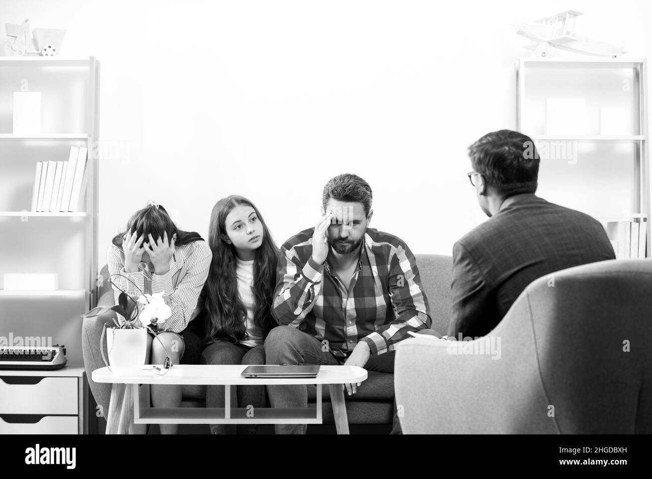 Psychology, mental family therapy, psychologist with family at psychotherapy session on