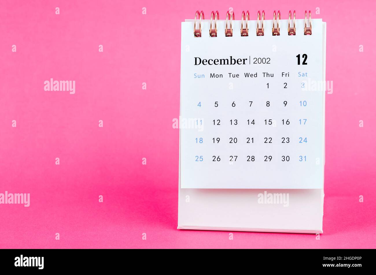 The December 2022 desk calendar on pink background Stock Photo - Alamy