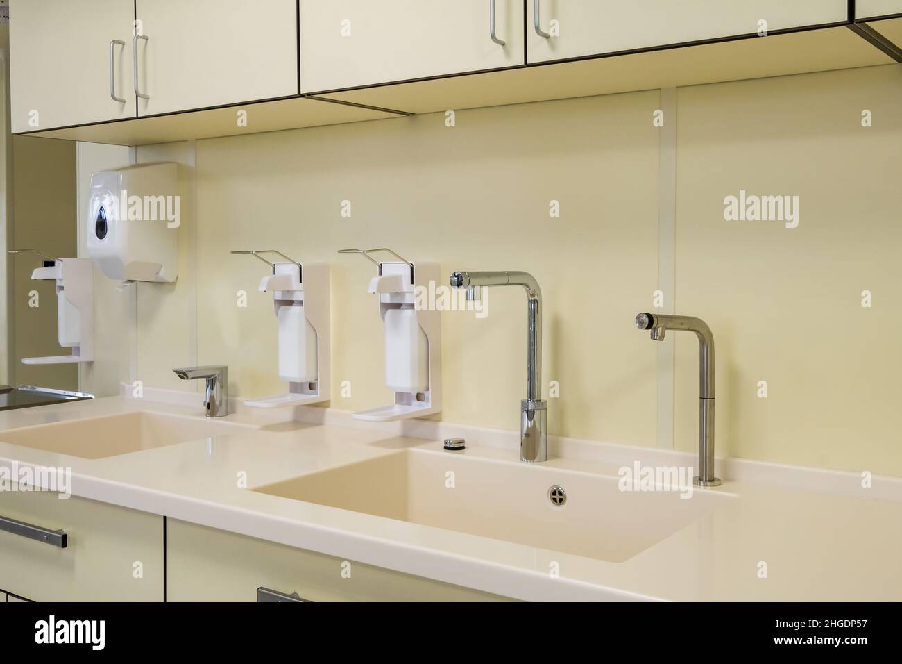 elbow soap and antiseptic dispenser or sanitizer wall mounted for hand